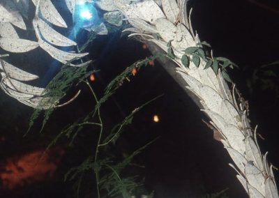 brass tree at night